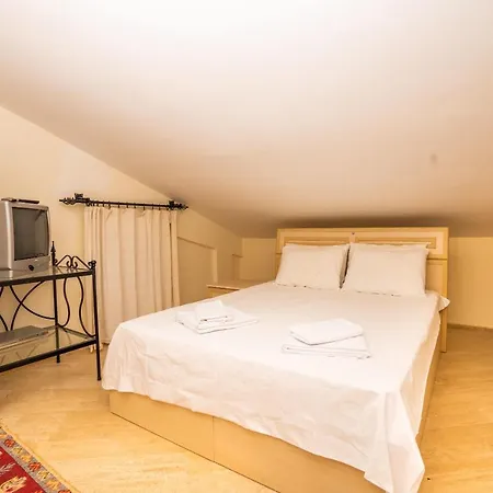 Delightful Flat Close To Public Beach With Shared Pool And Terrace With A Stunning View In Apartment Kalkan